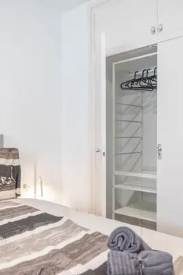 Cama o camas de una habitación en Hauzify I Apartament Big Family