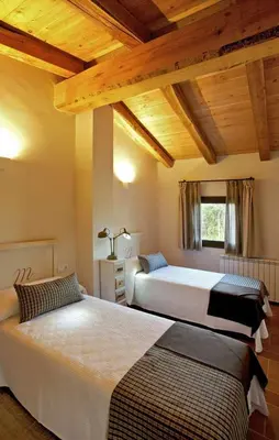 Cama o camas de una habitación en Mas Garriga Turisme Rural