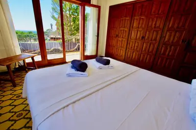 Cama o camas de una habitación en V&V LLORET- VILLA MEDITERRANIA, preciosa villa con panorámicas vistas mar en zona muy tranquila y residencial