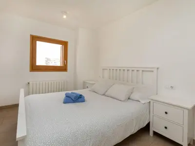 Cama o camas de una habitación en Apartment Blue Tossa by Interhome