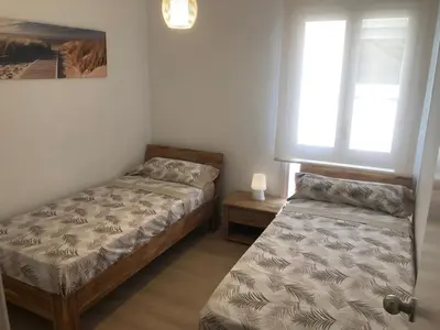 Cama o camas de una habitación en BLANES APARTAMENTO