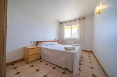 Cama o camas de una habitación en HomeHolidaysRentals Destan - Costa Barcelona