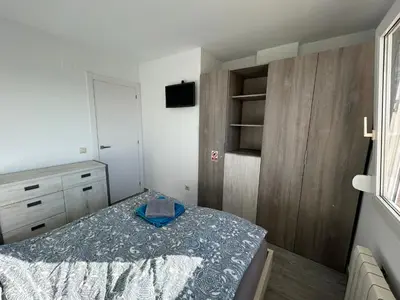 Cama o camas de una habitación en Apartment direkt am Strand