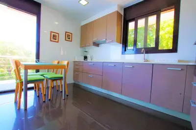 Una cocina o zona de cocina en V&V LLORET- Villa Nicole