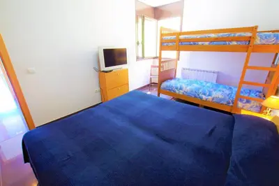 Cama o camas de una habitación en V&V LLORET- Villa Nicole