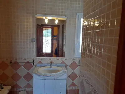 Un baño de Pretty Villa with Sun Loungers