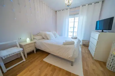 Cama o camas de una habitación en HomeHolidaysRentals Plume - Costa Barcelona