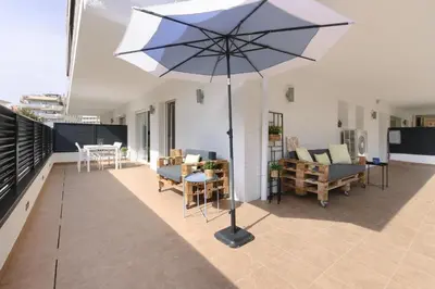 Un balcón o terraza de LETS HOLIDAYS NICE APARTMENT with BIG TERRACE IN TOSSA