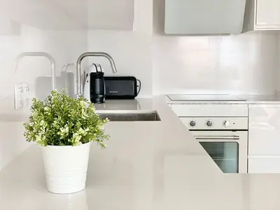 Una cocina o zona de cocina en Ático con Vistas al Mar a un Paso del Centro