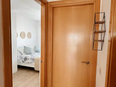Cama o camas de una habitación en Ático con Vistas al Mar a un Paso del Centro