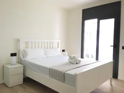 Cama o camas de una habitación en Aiguaneu Luxury Nàutic
