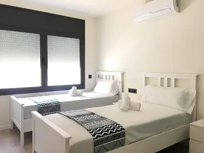 Cama o camas de una habitación en Aiguaneu Luxury Nàutic
