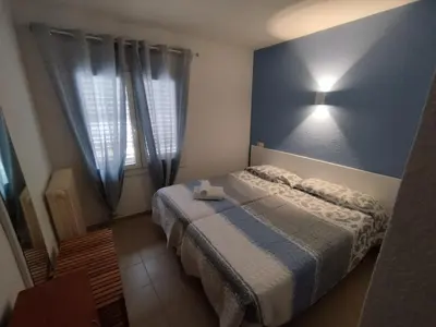 Cama o camas de una habitación en Apartamento Zodiac AB 6H