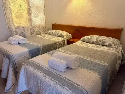 Cama o camas de una habitación en Apartamento Zodiac AB 4B