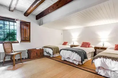 Cama o camas de una habitación en Masia 1612. Muy cerca de las playas. Costa Brava