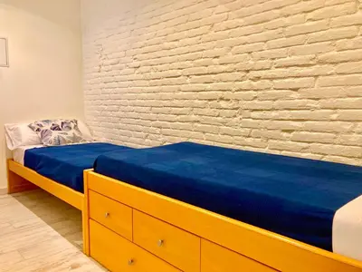 Cama o camas de una habitación en Casa Mediterránia de Palamós amb piscina privada