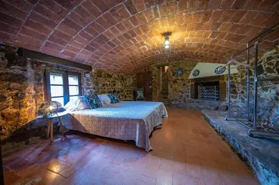 Cama o camas de una habitación en Castillo Can Xirau Piscina Privada Vistas Mar Aire Acondicionado