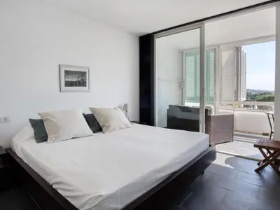 Cama o camas de una habitación en Nardos Apartament reformat amb encant per 5 persones a 10 minuts de la platja