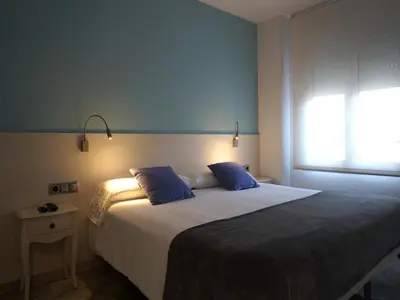 Cama o camas de una habitación en Llevant I Ponent