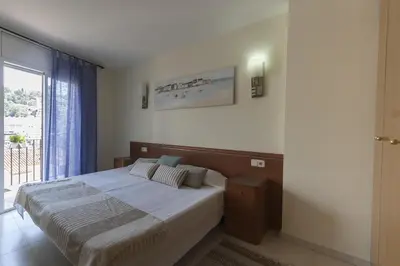 Cama o camas de una habitación en LETS HOLIDAYS Beautiful apartment in the center of tossa de mar