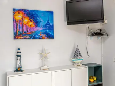 Una televisión o centro de entretenimiento en Apartment Willis by Interhome