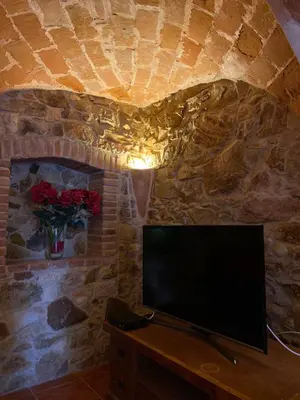Una televisión o centro de entretenimiento en MASÍA CAN GEMENUT, a 5O METROS DEL MAR