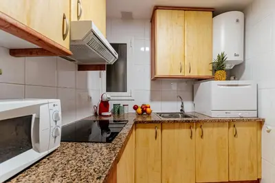 Una cocina o zona de cocina en Apartament Orient a Palamós tercera línia de mar