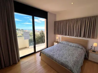 Cama o camas de una habitación en Villa de lujo con vistas al mar y piscina privada