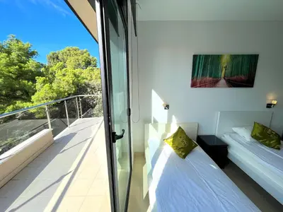 Cama o camas de una habitación en Villa de lujo con vistas al mar y piscina privada