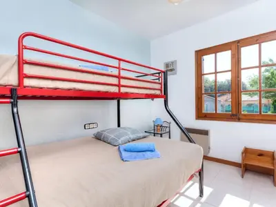 Cama o camas de una habitación en Holiday Home Cabanyes by Interhome