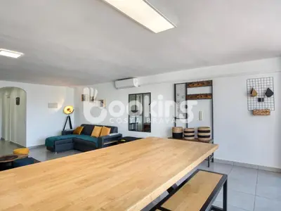 Zona de estar de Begonias Apartament per 4 persones amb gran terrassa chill out a 10 minuts de la platja