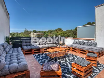 Zona de estar de Begonias Apartament per 4 persones amb gran terrassa chill out a 10 minuts de la platja
