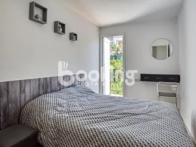 Cama o camas de una habitación en Begonias Apartament per 4 persones amb gran terrassa chill out a 10 minuts de la platja