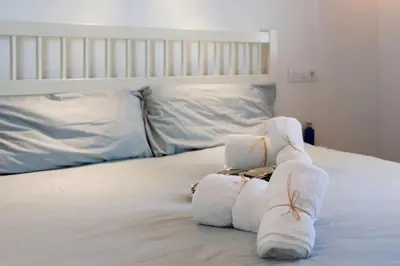 Cama o camas de una habitación en Spacious apartment with city view in Llafranc - 98 m²