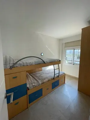Cama o camas de una habitación en Piso a 150 mts de la playa con espectacular terraza y WIFI