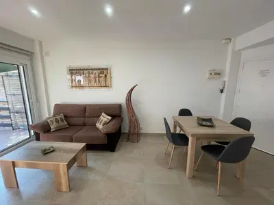 Zona de estar de Piso a 150 mts de la playa con espectacular terraza y WIFI