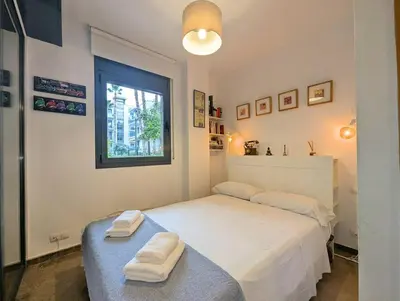 Cama o camas de una habitación en Relax en Lloret con Gym y Piscina by Host&Joy