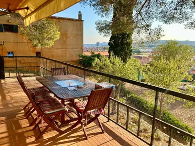 Un balcón o terraza de Casa amb piscina i jardí a Palamós per 6 persones