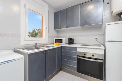 Una cocina o zona de cocina en Apartaments Aiguablava