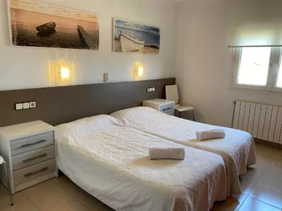 Cama o camas de una habitación en Àtic espectacular a Palamós