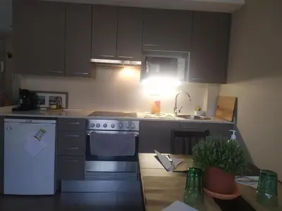 Una cocina o zona de cocina en Apartamento Arenys de Munt - Costa Barcelona, Maresme -