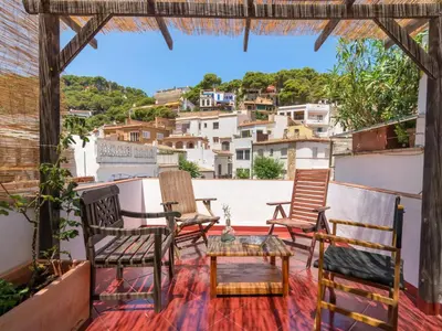 Un balcón o terraza de Charming Fisherman's House Sa Tuna Beach
