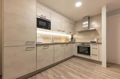 Una cocina o zona de cocina en Bravissimo Calderers El Drac, one-bedroom apartment