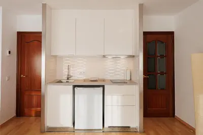 Una cocina o zona de cocina en Vistes al mar Ideal per parelles i teletreball