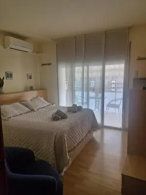 Cama o camas de una habitación en Triplex
