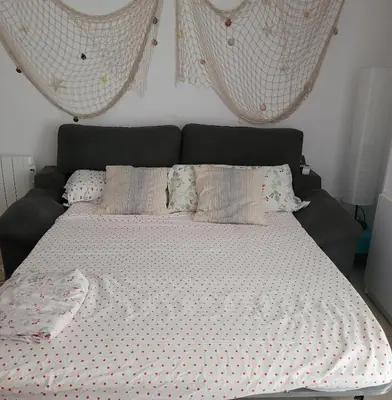 Cama o camas de una habitación en Delante del Mar