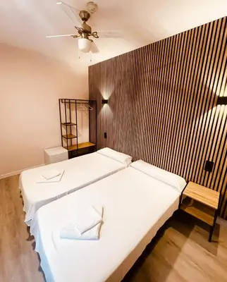 Cama o camas de una habitación en COLIBRI