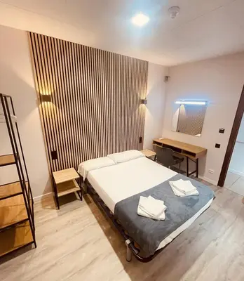 Cama o camas de una habitación en COLIBRI