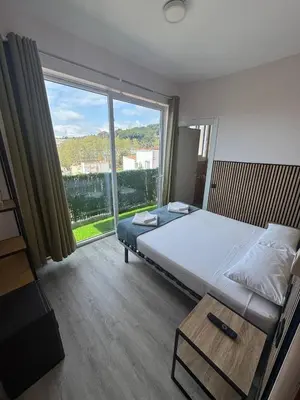 Cama o camas de una habitación en COLIBRI