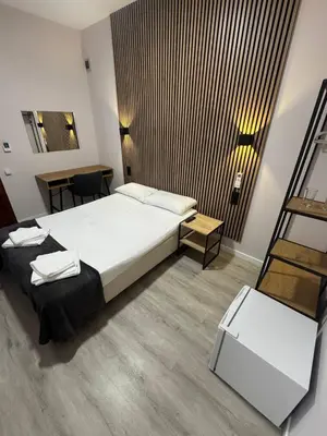 Cama o camas de una habitación en COLIBRI